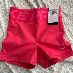 Nike Women's Bright Pink Athletic Shorts